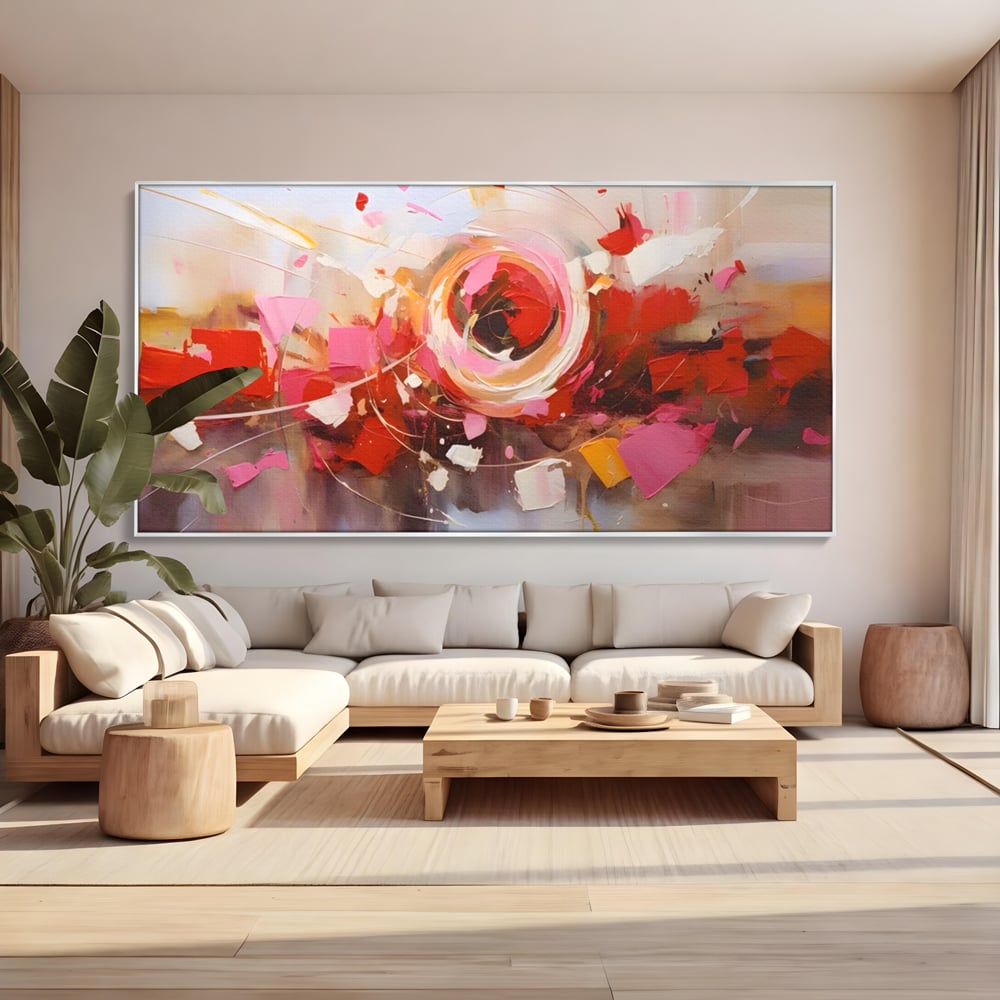 Tablou canvas cu tablou canvas cu floare abstracta si culori vibrante, in rama de aluminiu argintiu, pe perete intr-un living